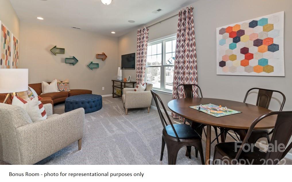 4039 Charlton Road, Unit 276 Fort Mill, SC 29715 - Photo 18 of 29 a living room with furniture and a table
