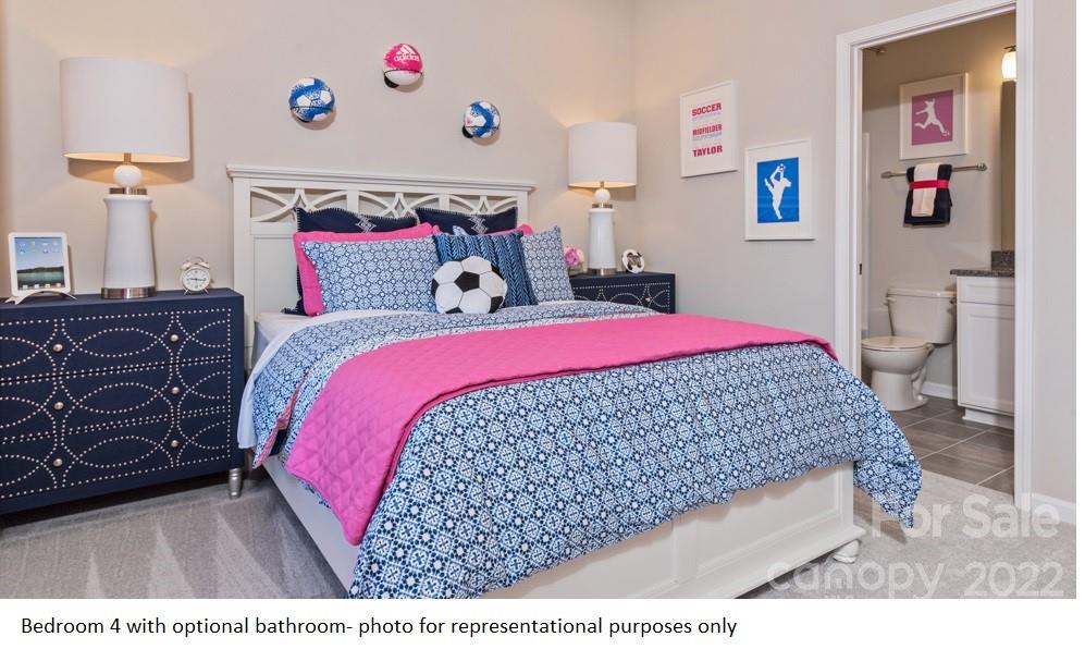 4039 Charlton Road, Unit 276 Fort Mill, SC 29715 - Photo 24 of 29 a bedroom with a bed and cabinets