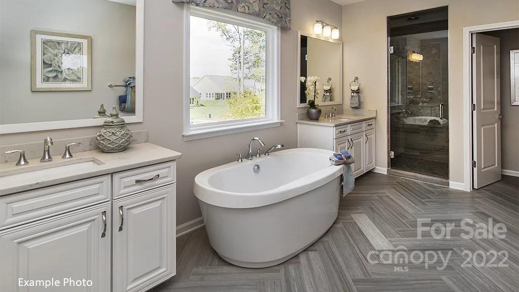 4039 Charlton Road, Unit 276 Fort Mill, SC 29715 - Photo 27 of 29 a bathroom with a sink and a bathtub
