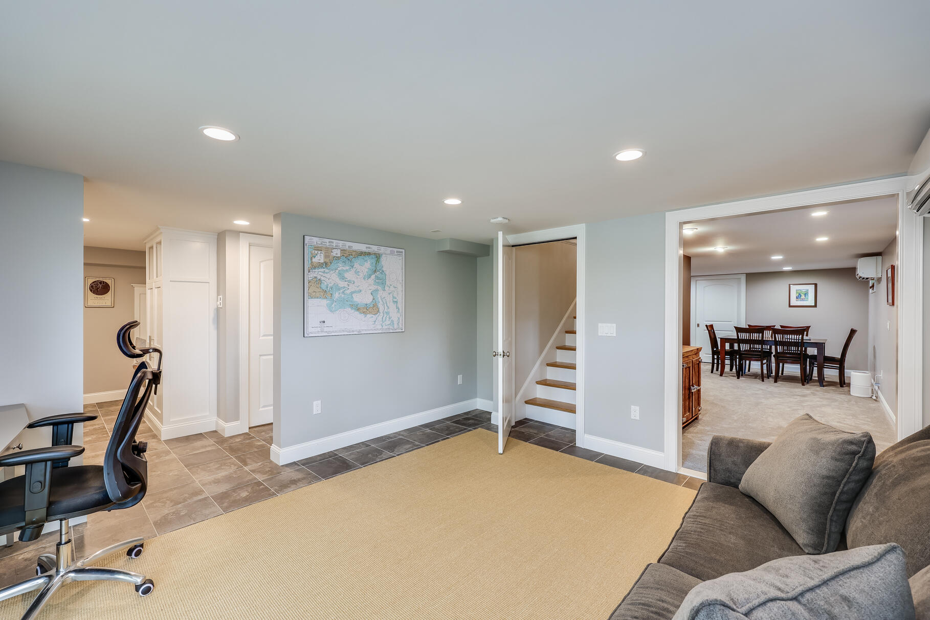 24 Bay Road Cotuit, MA 02635 - Photo 22 of 44 a view of a livingroom with furniture and a gym equipment