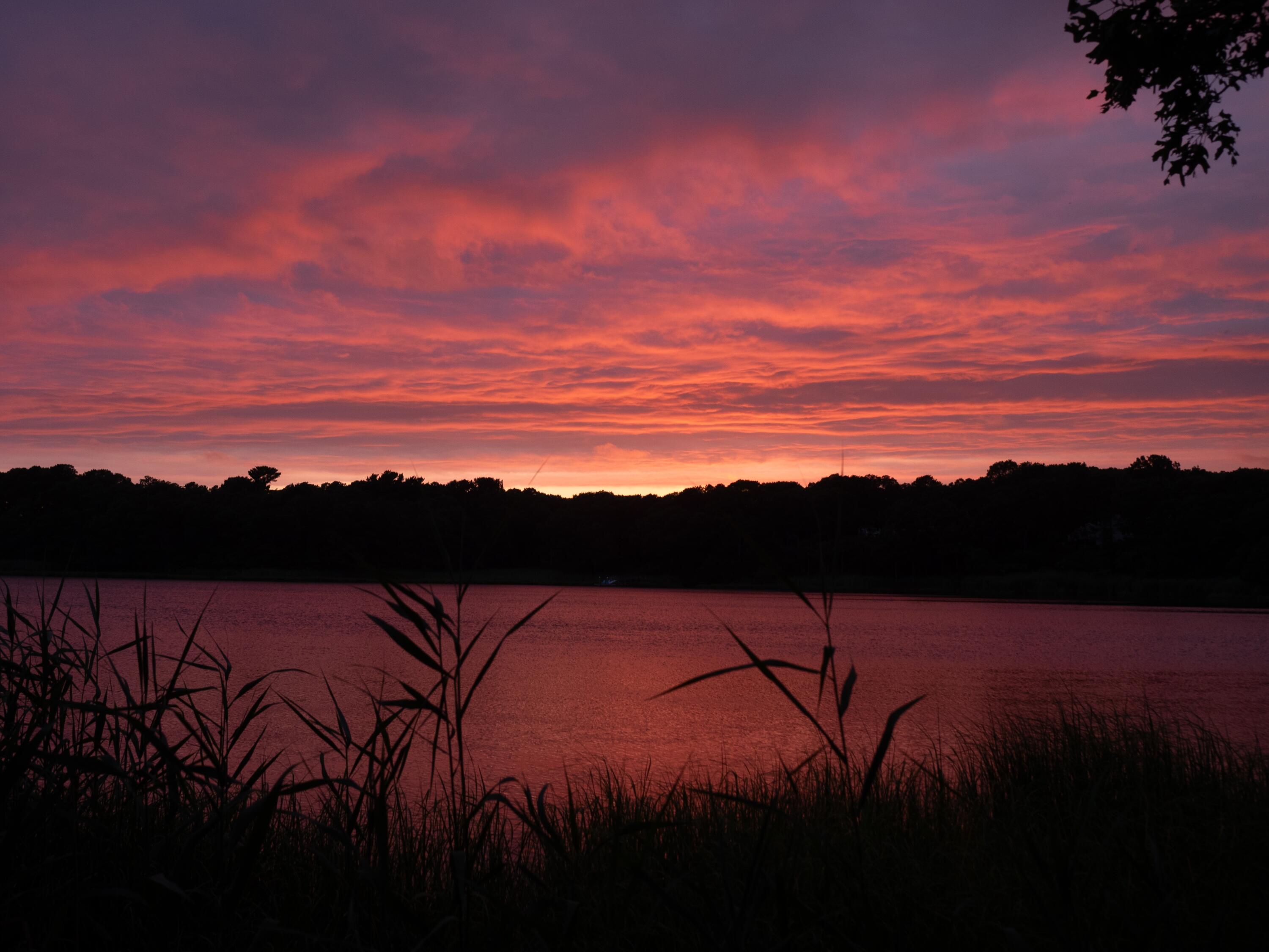 24 Bay Road Cotuit, MA 02635 - Photo 40 of 44 a view of mountain with sunset in background
