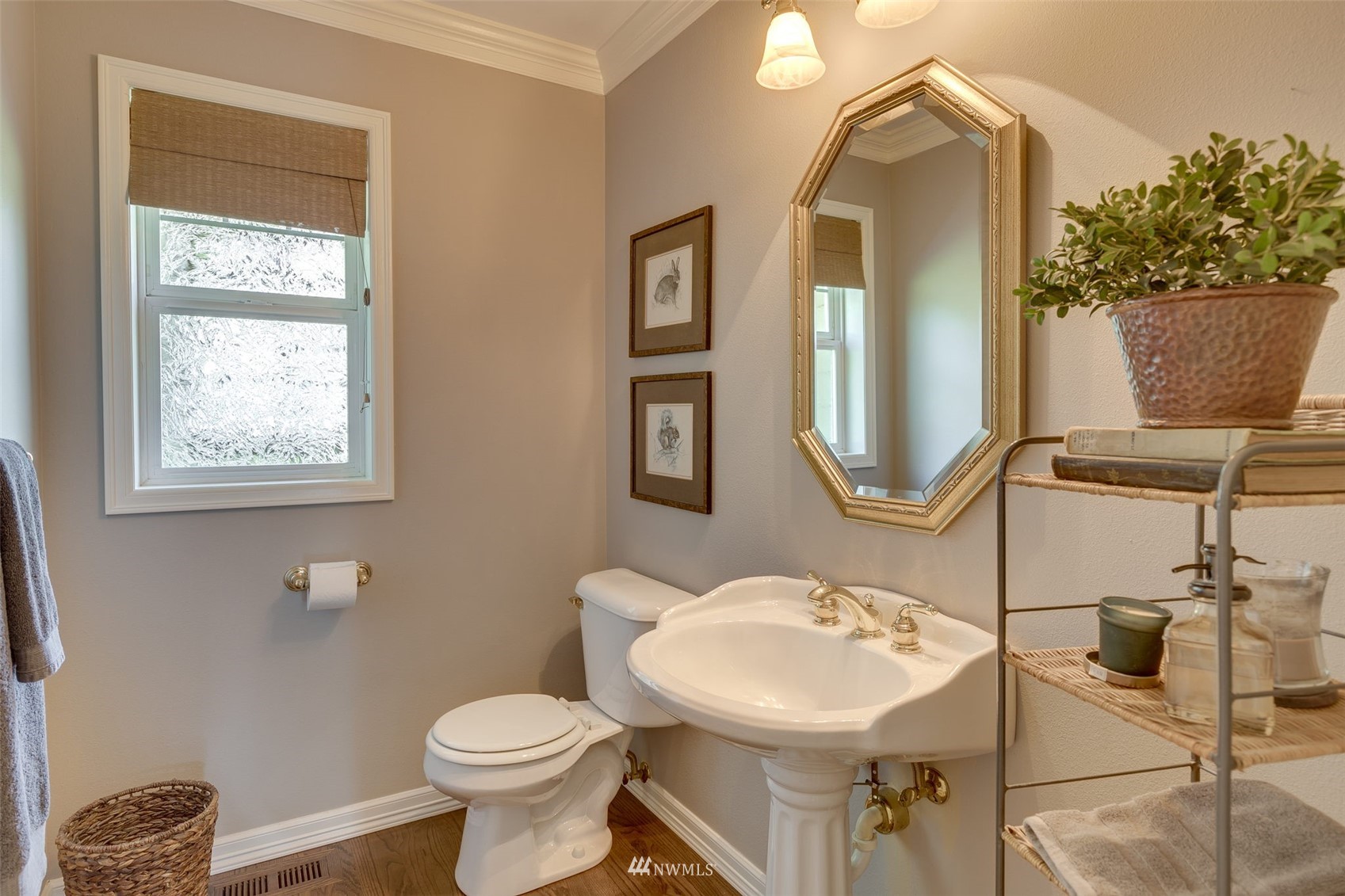 14919 Westwick Road Snohomish, WA 98290 - Photo 17 of 37 a bathroom with a toilet sink and mirror