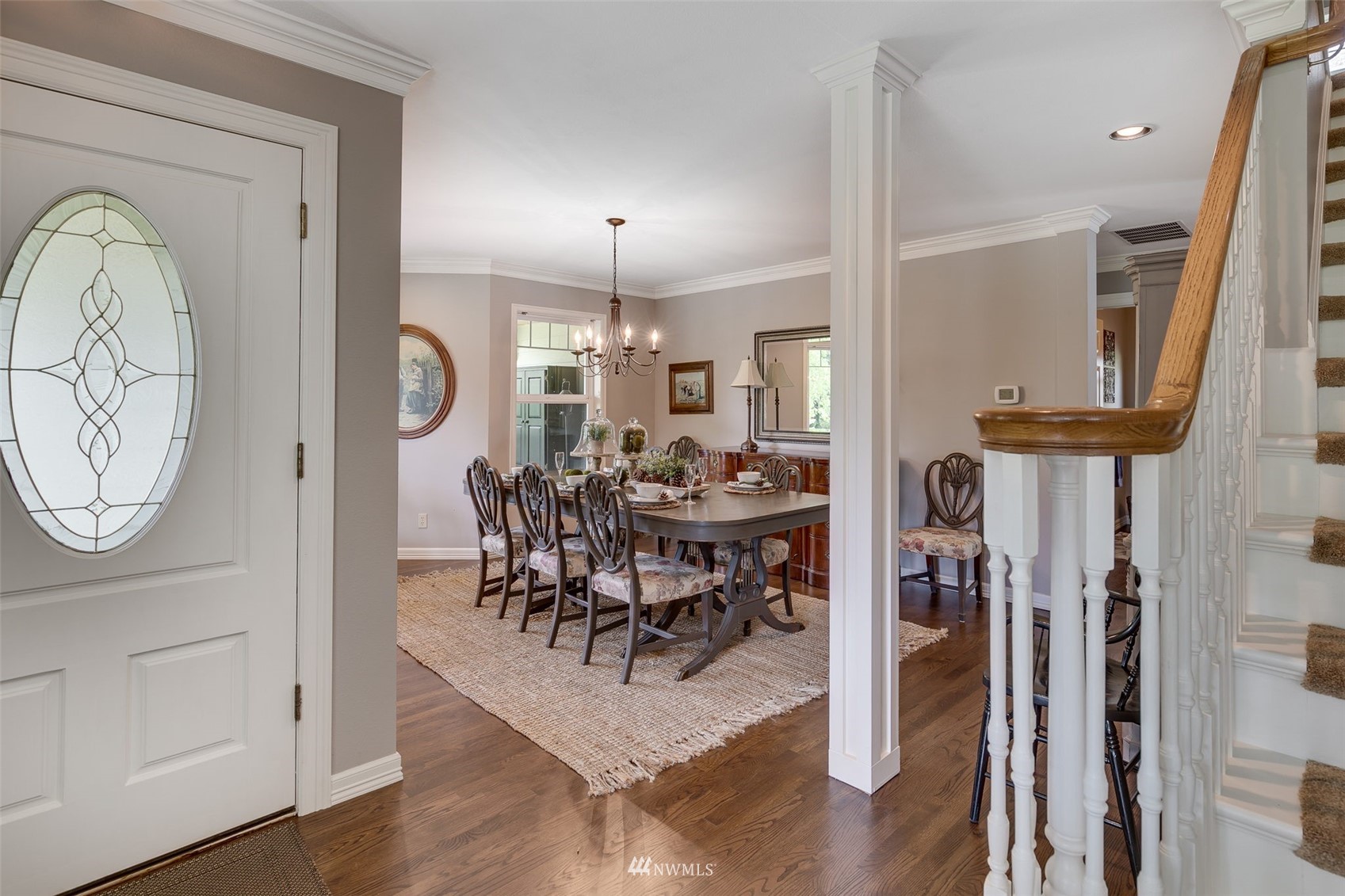 14919 Westwick Road Snohomish, WA 98290 - Photo 18 of 37 a view of a dining area with furniture and a large window