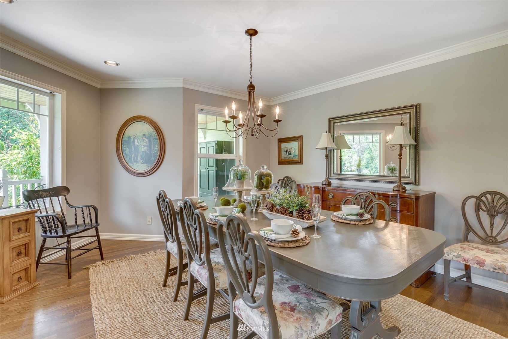 14919 Westwick Road Snohomish, WA 98290 - Photo 19 of 37 a view of a dining room with furniture window and wooden floor