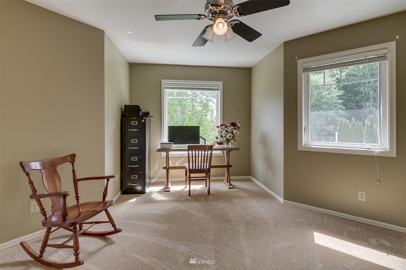 14919 Westwick Road Snohomish, WA 98290 - Photo 26 of 37 a living room with furniture and a window