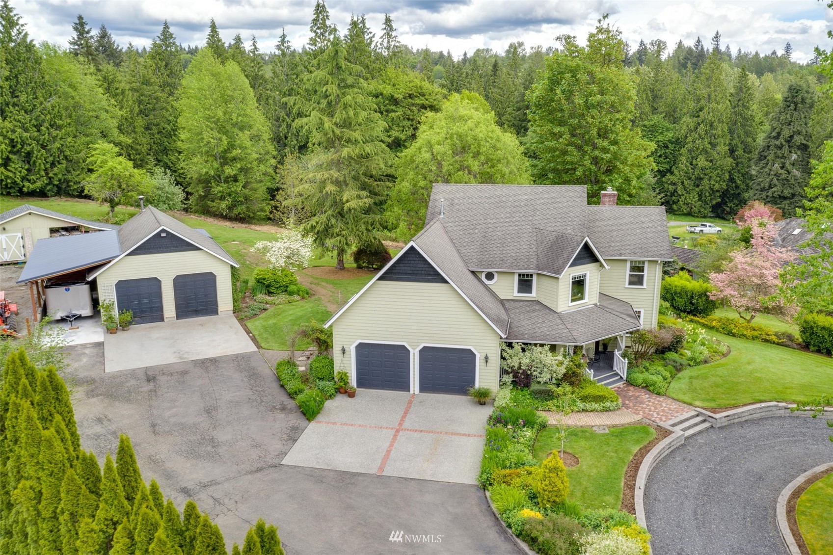 14919 Westwick Road Snohomish, WA 98290 - Photo 31 of 37 a aerial view of a house with swimming pool and garden