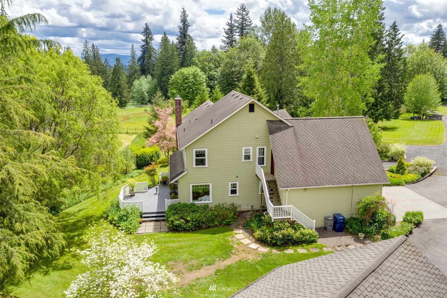 14919 Westwick Road Snohomish, WA 98290 - Photo 33 of 37 a aerial view of a house next to a yard