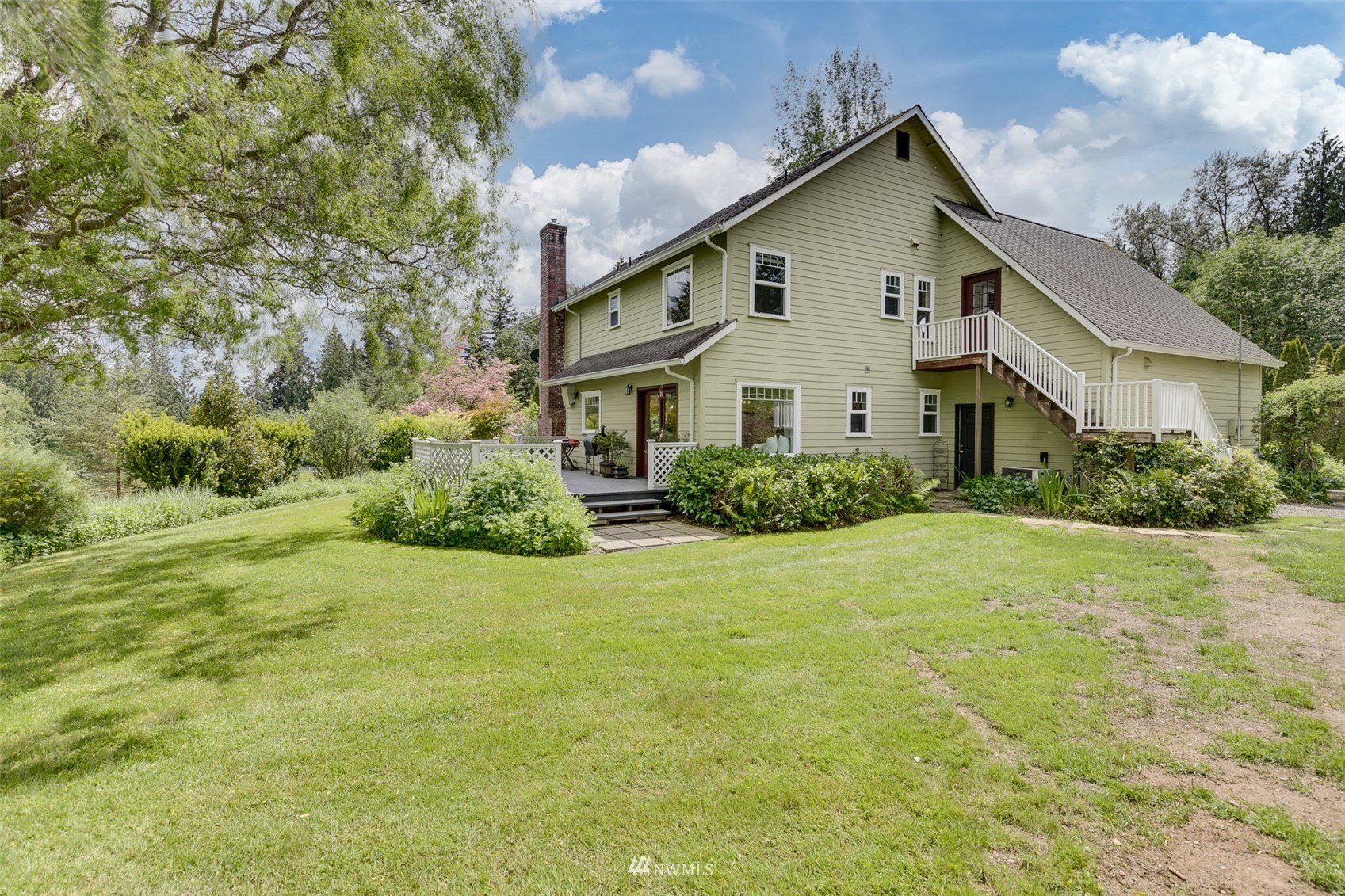 14919 Westwick Road Snohomish, WA 98290 - Photo 36 of 37 a front view of a house with a yard
