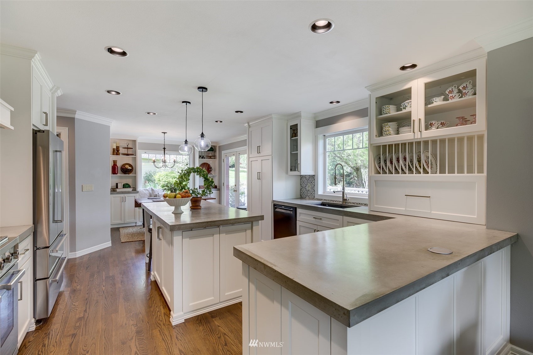 14919 Westwick Road Snohomish, WA 98290 - Photo 9 of 37 a kitchen with stainless steel appliances granite countertop a sink stove and refrigerator