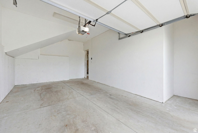 1389 Millbrook Way Bountiful, UT 84010 - Photo 58 of 74 Spacious garage featuring concrete flooring and white painted walls