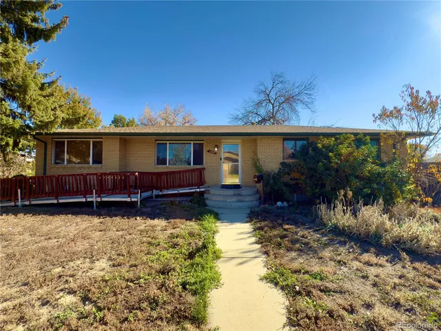 a house view with a garden space