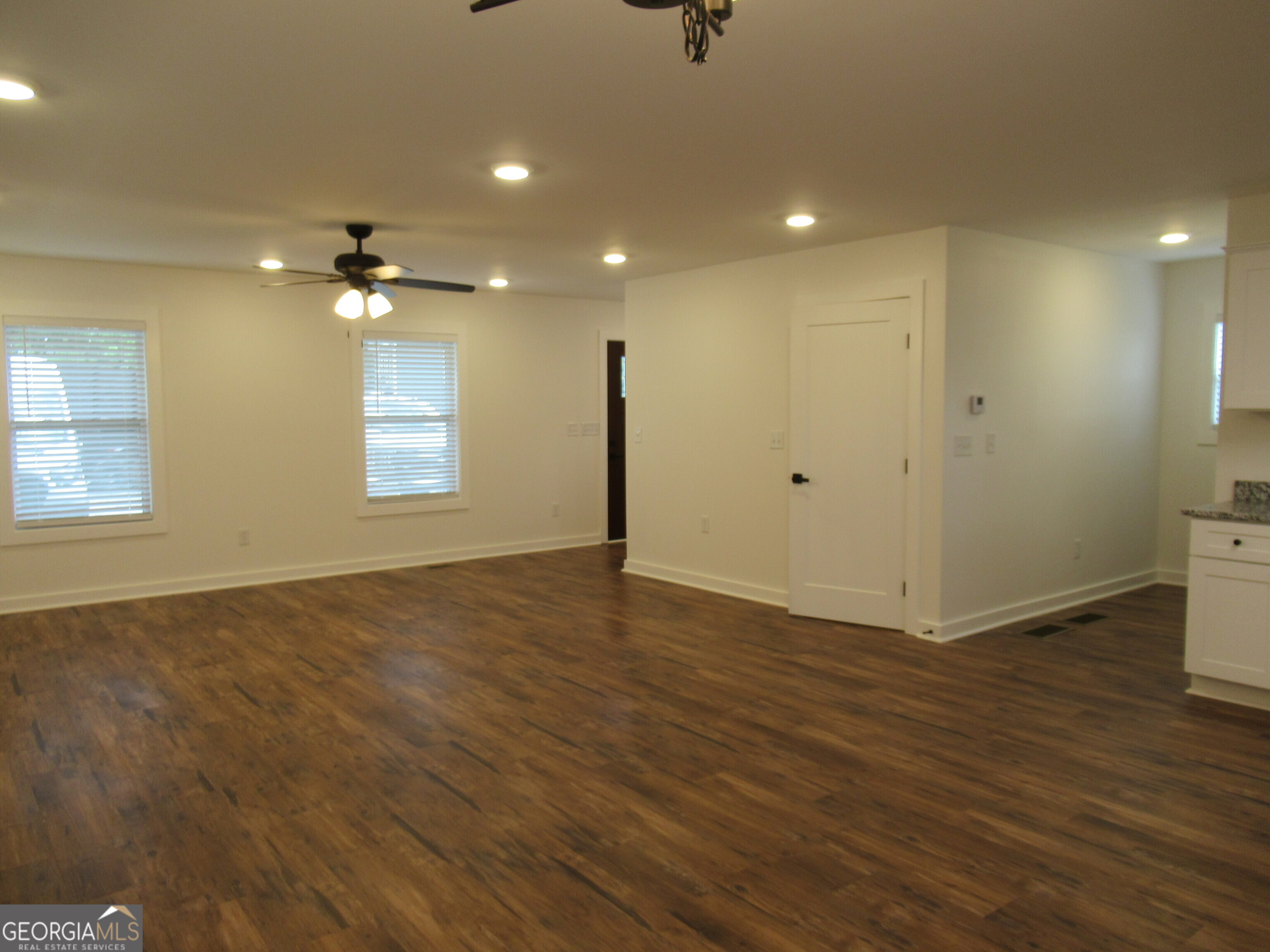 765 Old Kerns Road Dawsonville, GA 30534 - Photo 13 of 36 a view of an empty room with a window