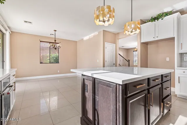 a kitchen with a stove and a microwave