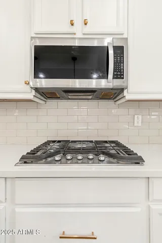 a view of entryway with a front door