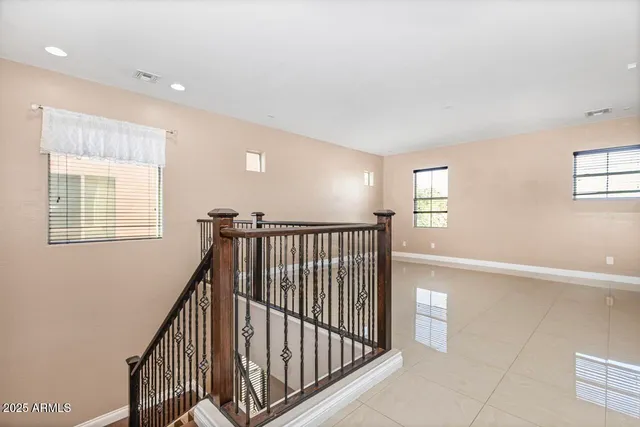 a view of a hallway with a window