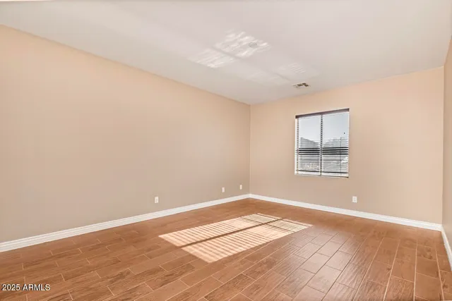 a view of an empty room and window