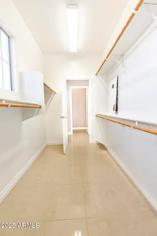 a view of backyard with a patio