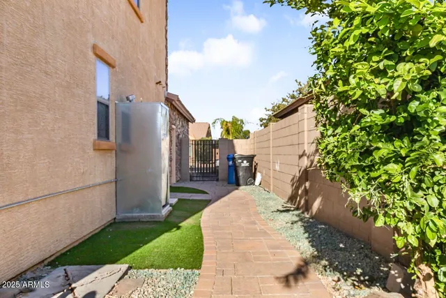 a view of a balcony with chair and tables
