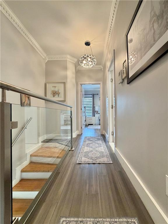 463 82nd Street Brooklyn, NY 11209 - Photo 14 of 16 a view of a hallway view with wooden floor and staircase