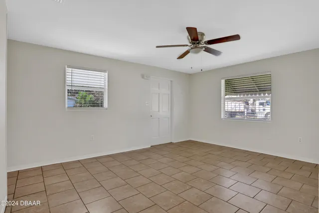 a view of an empty room and window