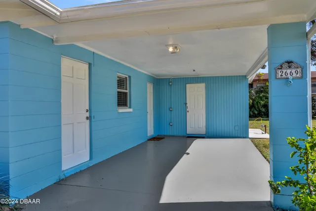 a view of a room with a garage