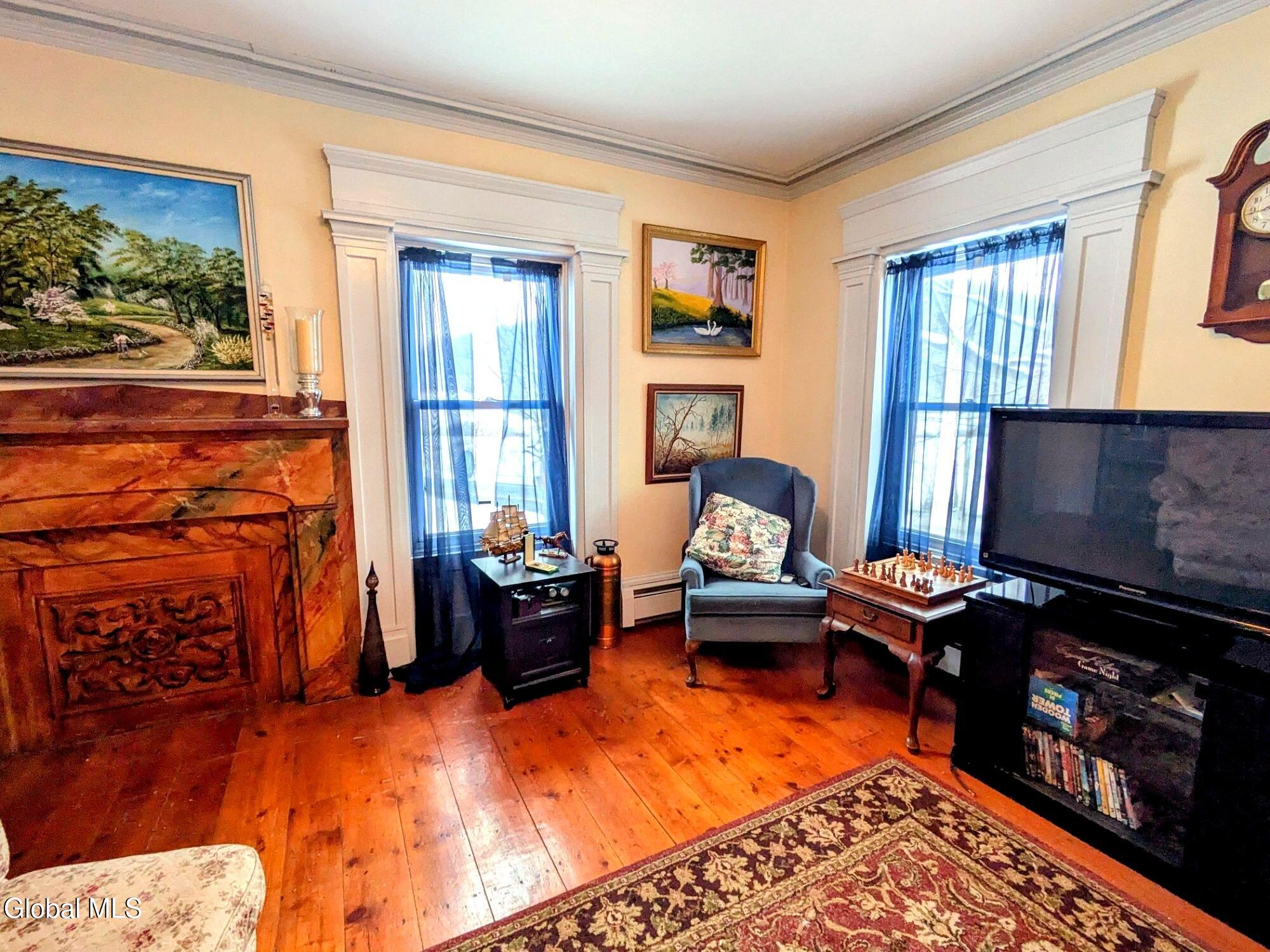 1483 County Rte 49 Argyle, NY 12809 - Photo 4 of 14 02_living_room_windows
