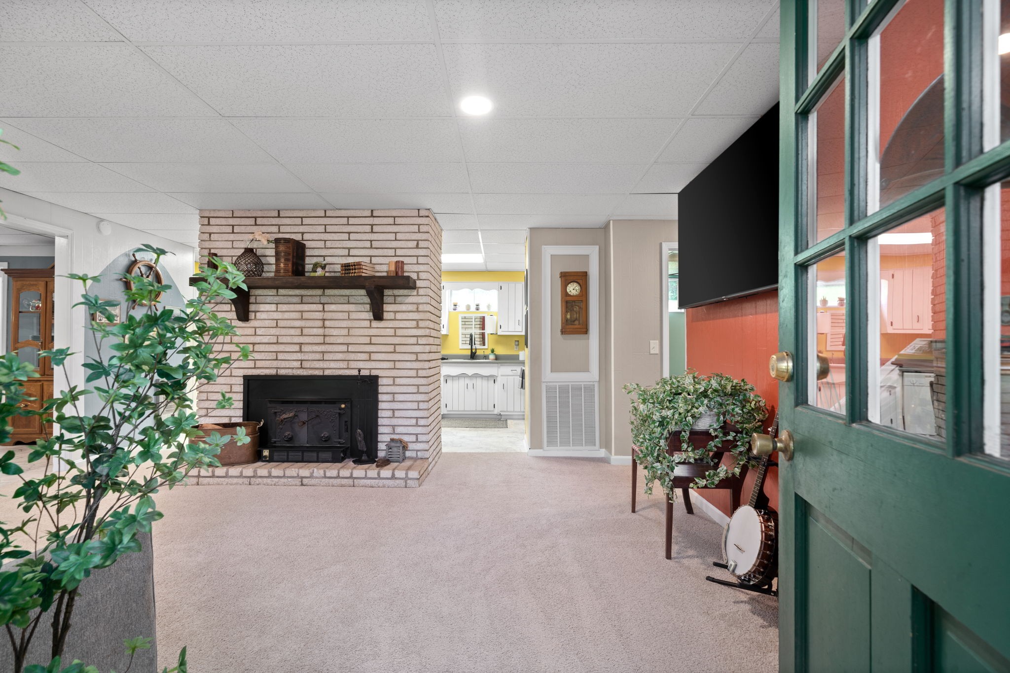 1040 Sensing Road Charlotte, TN 37036 - Photo 19 of 41 a living room with furniture and a fireplace