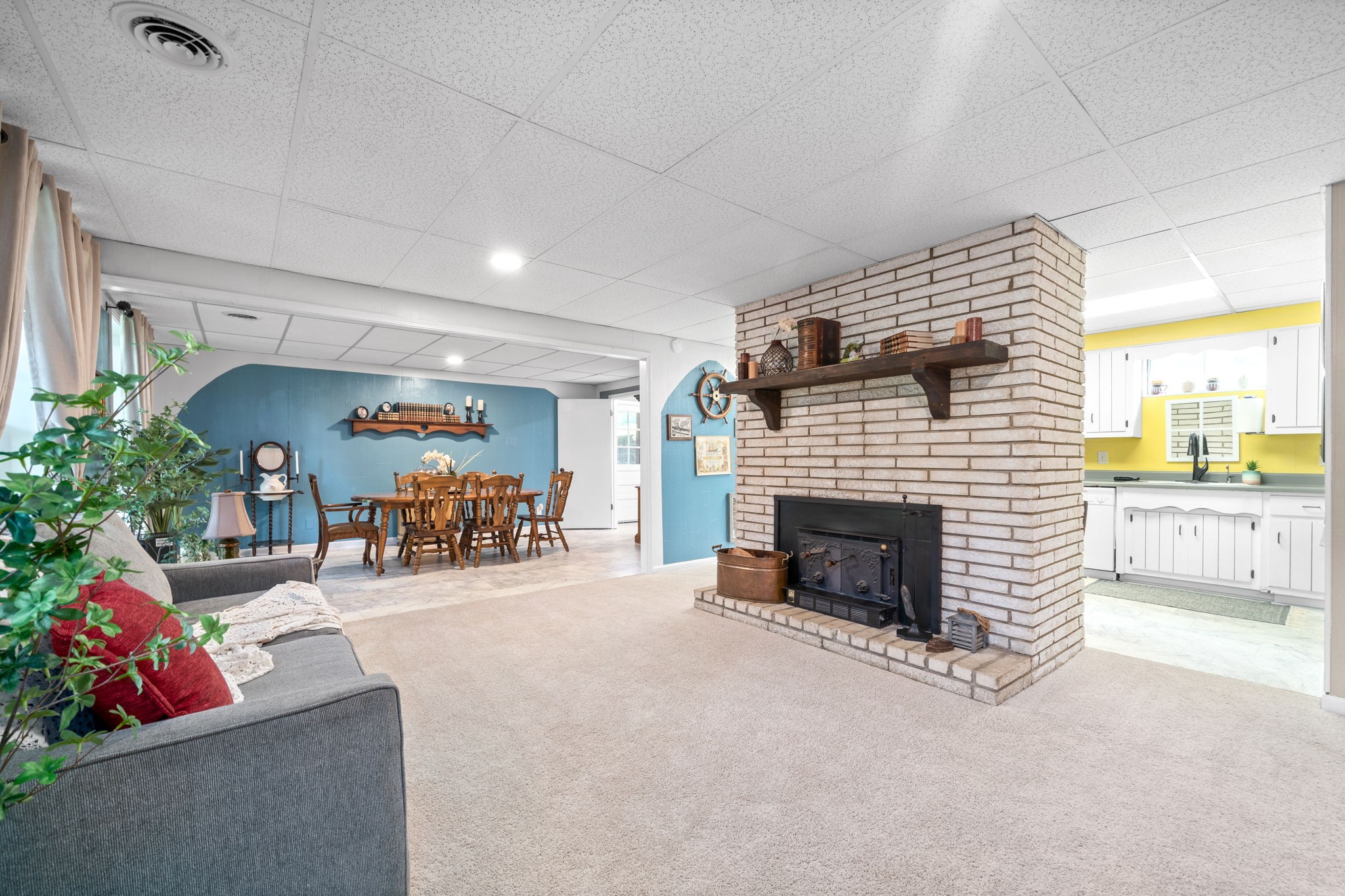 1040 Sensing Road Charlotte, TN 37036 - Photo 20 of 41 a living room with furniture and a fireplace