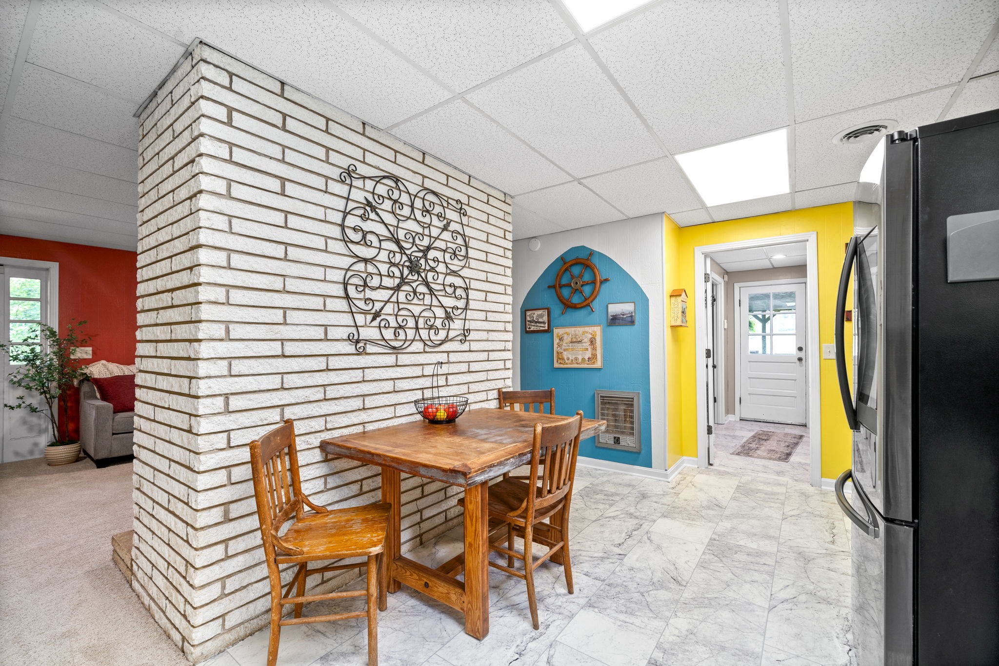 1040 Sensing Road Charlotte, TN 37036 - Photo 32 of 41 a dining room with a table and chairs