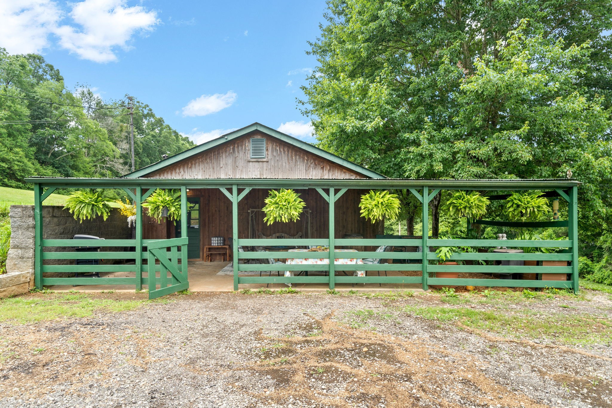 1040 Sensing Road Charlotte, TN 37036 - Photo 5 of 41 a view of a house with a yard