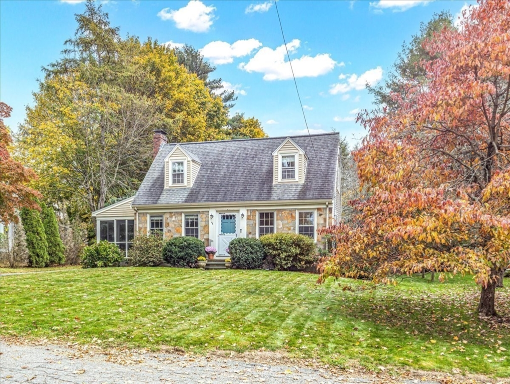 46 Park Street Dedham, MA 02026 - Photo 2 of 35 a front view of a house with garden