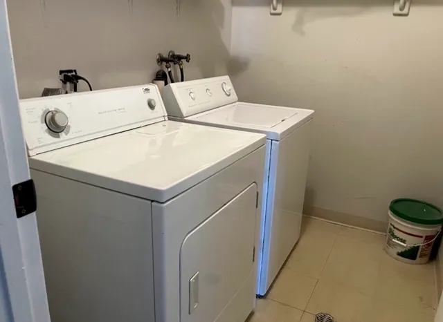 a view of backyard with deck and outdoor seating