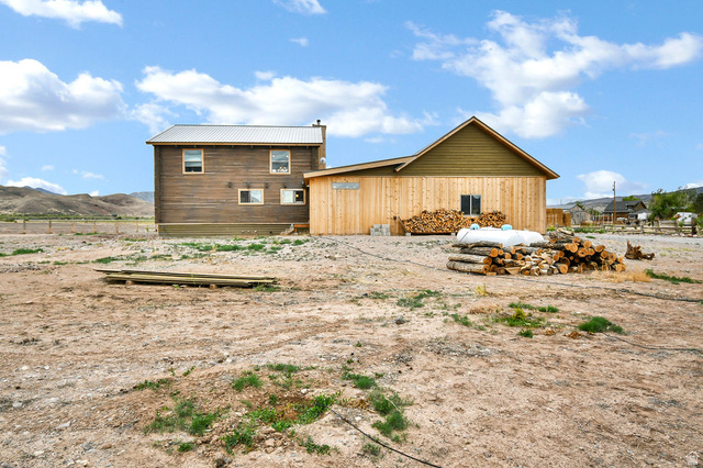544 East 600 North, Unit 1 Joseph, UT 84739 - Photo 42 of 65 Rear exterior featuring wood siding and a metal roof