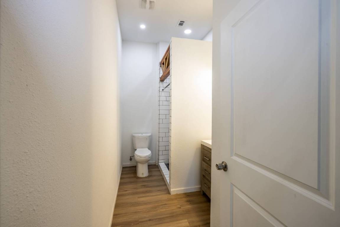 304 East 9th Nordheim, TX 78141 - Photo 16 of 33 a bathroom with a sink and a toilet