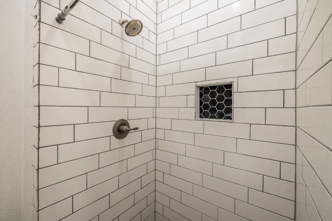 304 East 9th Nordheim, TX 78141 - Photo 17 of 33 a bathroom with a shower