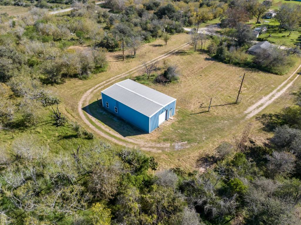 304 East 9th Nordheim, TX 78141 - Photo 26 of 33 a view of a yard with an outdoor space