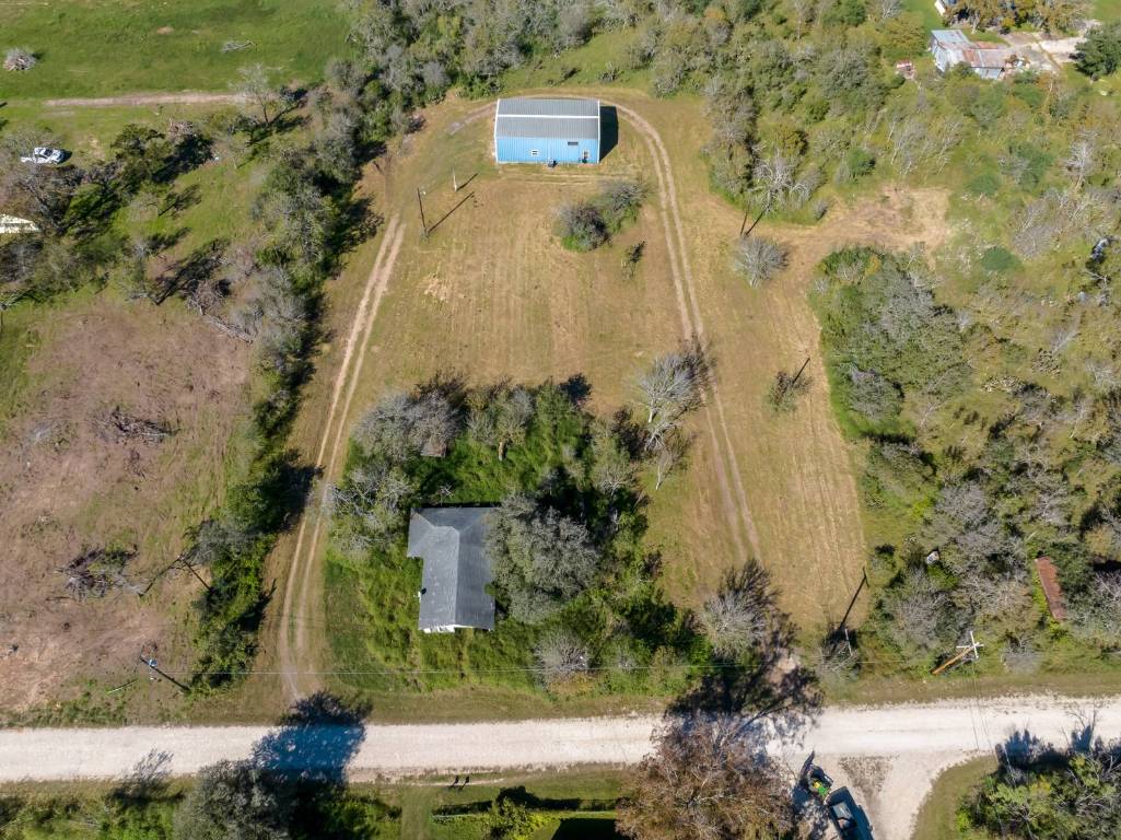 304 East 9th Nordheim, TX 78141 - Photo 28 of 33 a aerial view of a residential apartment building with a yard