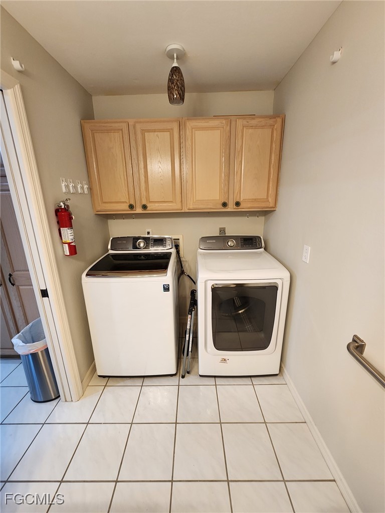 5390 Park Road, Unit 1 Fort Myers, FL 33908 - Photo 11 of 14 a utility room with dryer and washer