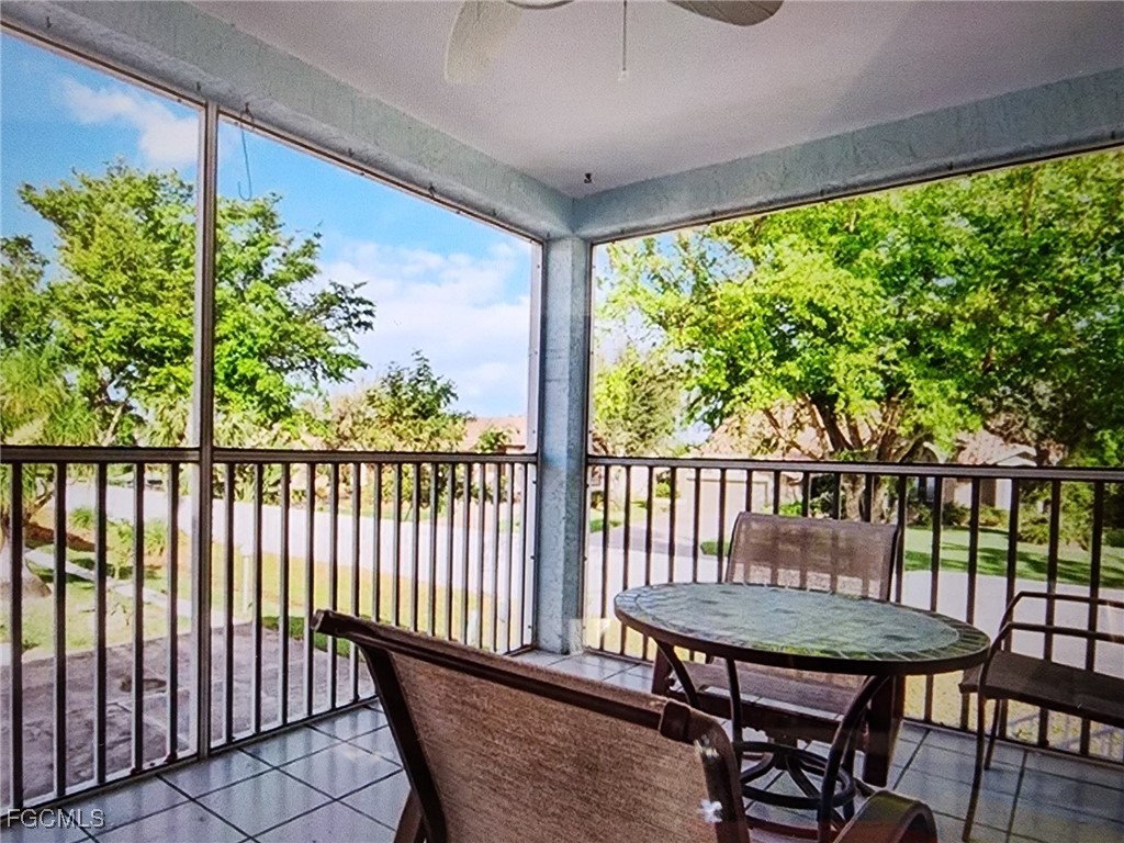 5390 Park Road, Unit 1 Fort Myers, FL 33908 - Photo 5 of 14 a view of a two chairs and table in the balcony