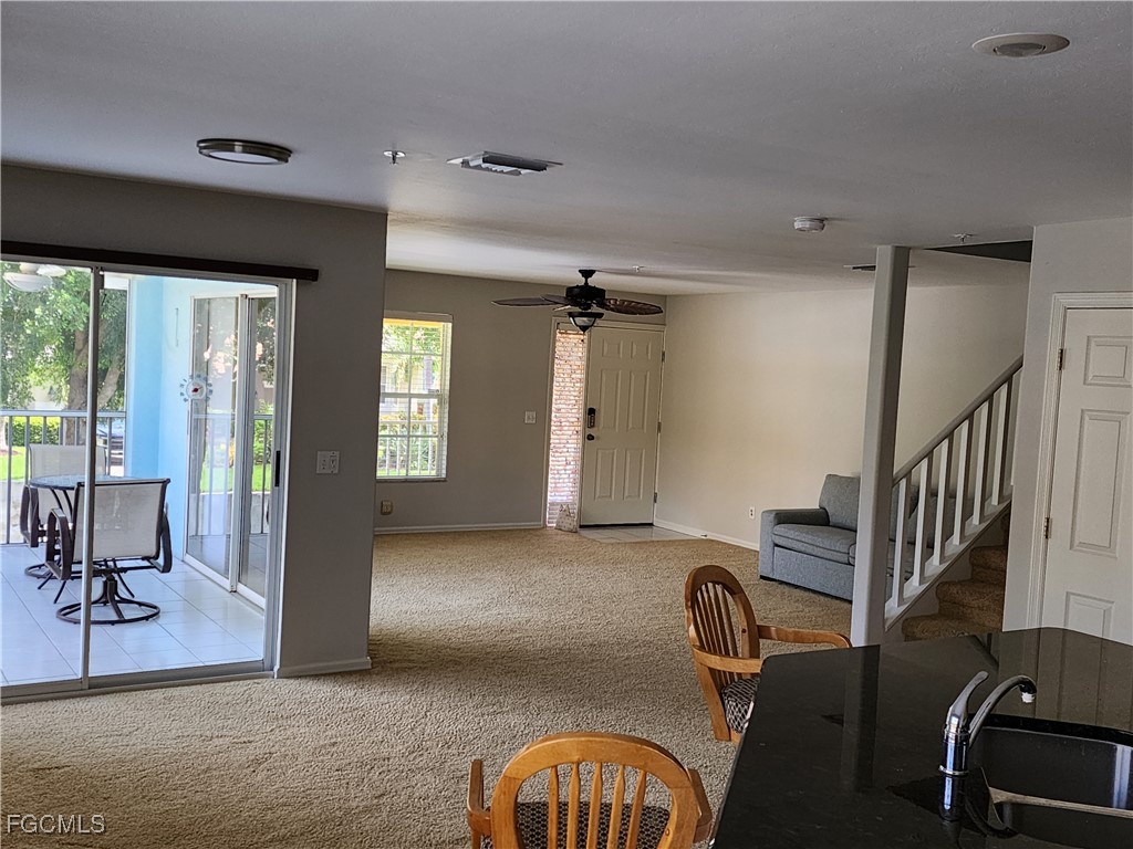 5390 Park Road, Unit 1 Fort Myers, FL 33908 - Photo 6 of 14 a view of a hall with chairs