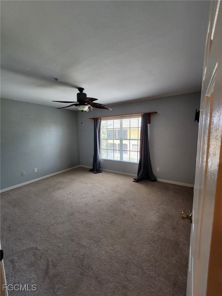 5390 Park Road, Unit 1 Fort Myers, FL 33908 - Photo 10 of 14 an empty room with windows