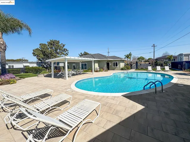 a view of a house with swimming pool