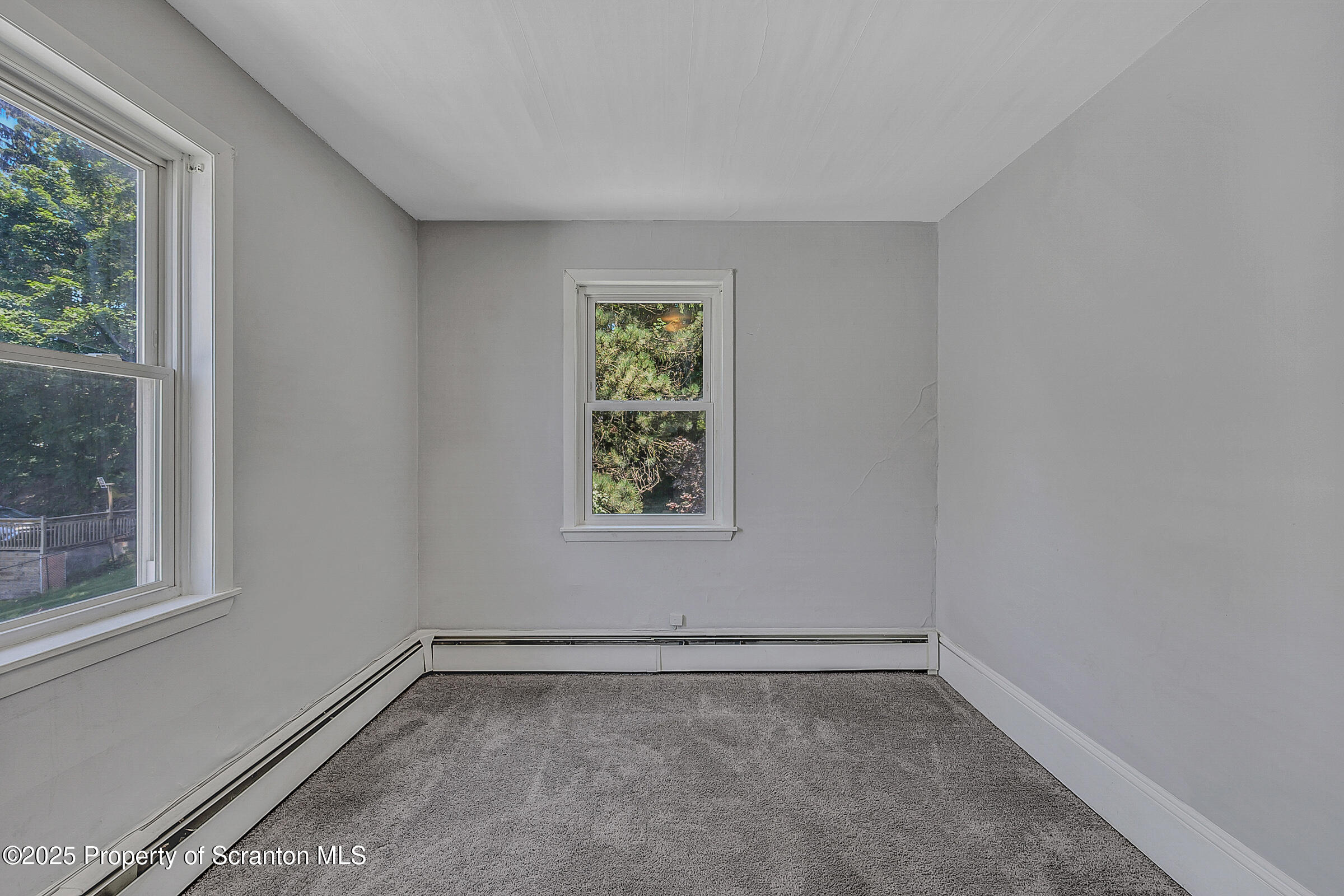 176 Johnson Street Pittston, PA 18640 - Photo 13 of 18 a view of a room that has a window in it