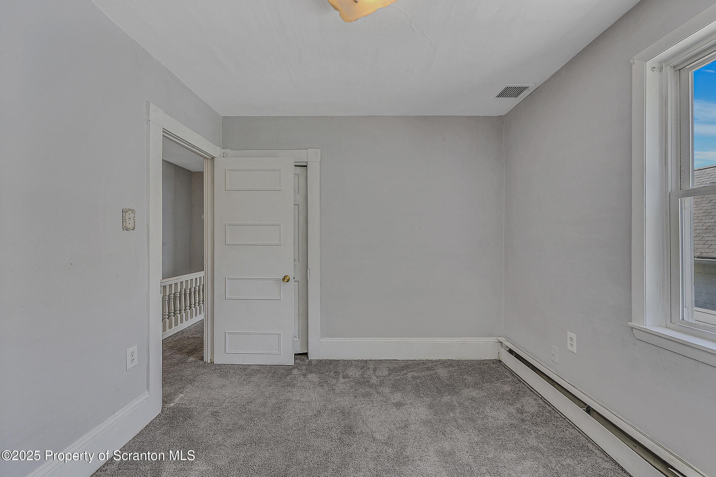 176 Johnson Street Pittston, PA 18640 - Photo 14 of 18 a view of an empty room