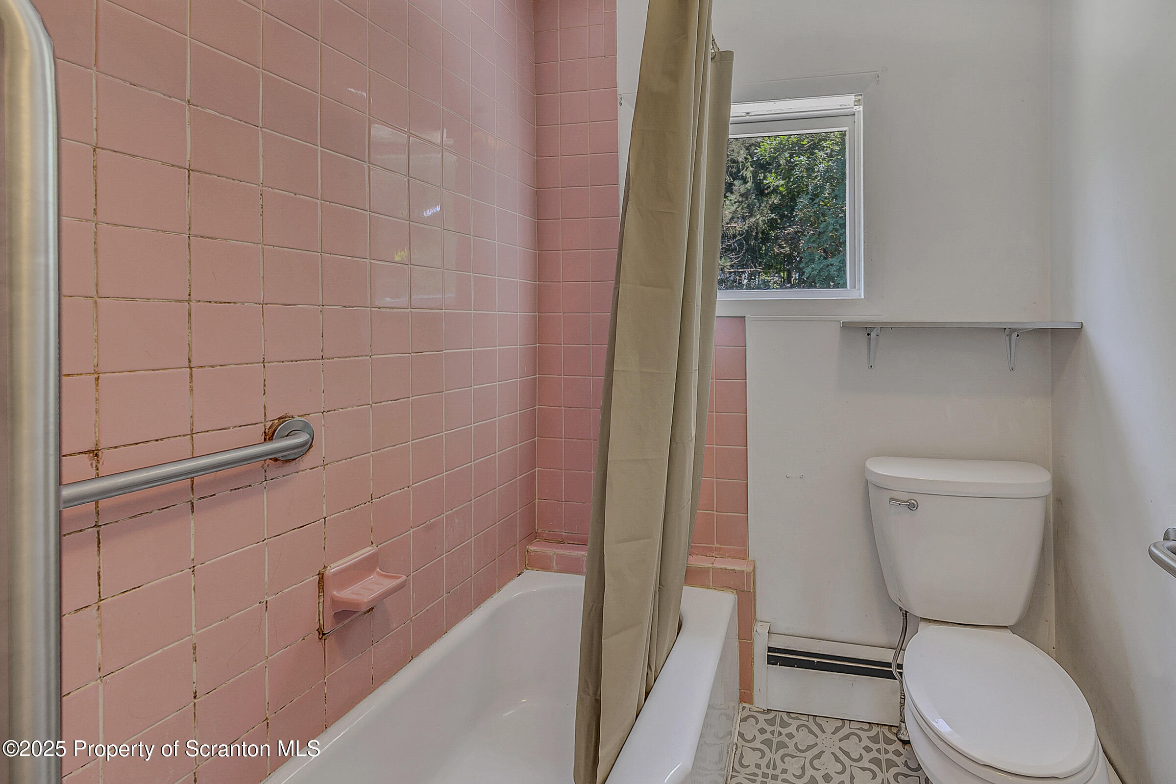 176 Johnson Street Pittston, PA 18640 - Photo 15 of 18 a bathroom with a toilet and a shower