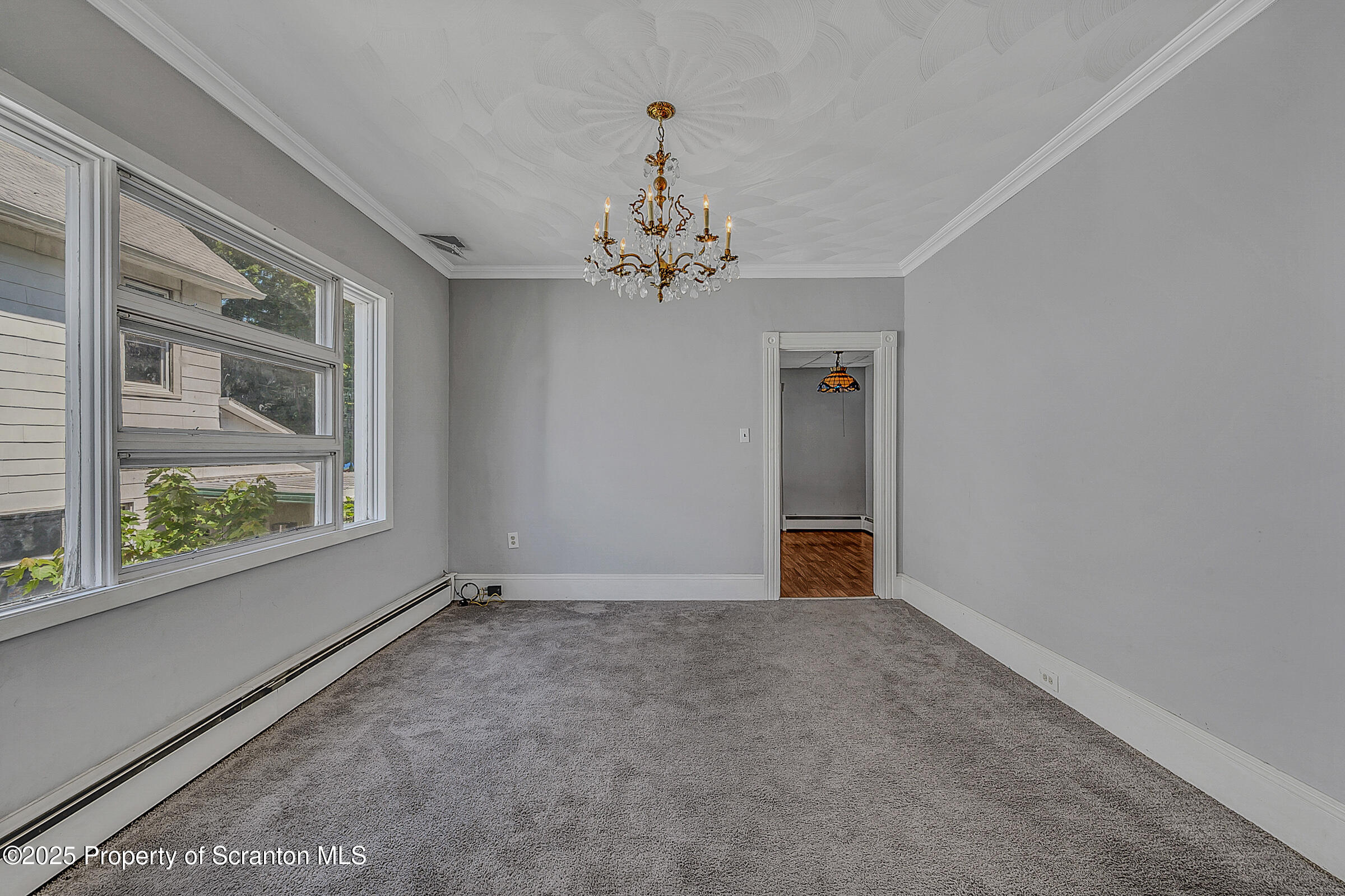 176 Johnson Street Pittston, PA 18640 - Photo 6 of 18 a view of an empty room with a window