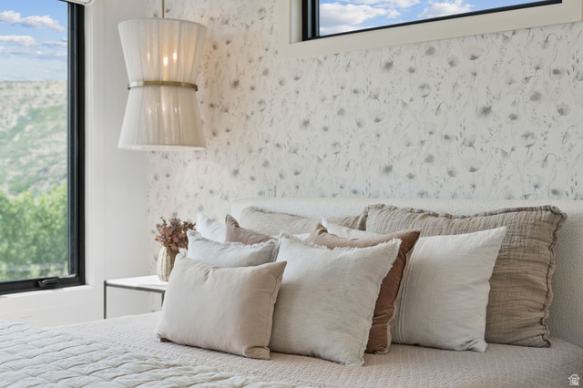 1400 Weber Wild Road Oakley, UT 84055 - Photo 27 of 55 Accent wall featuring floral-patterned wallpaper