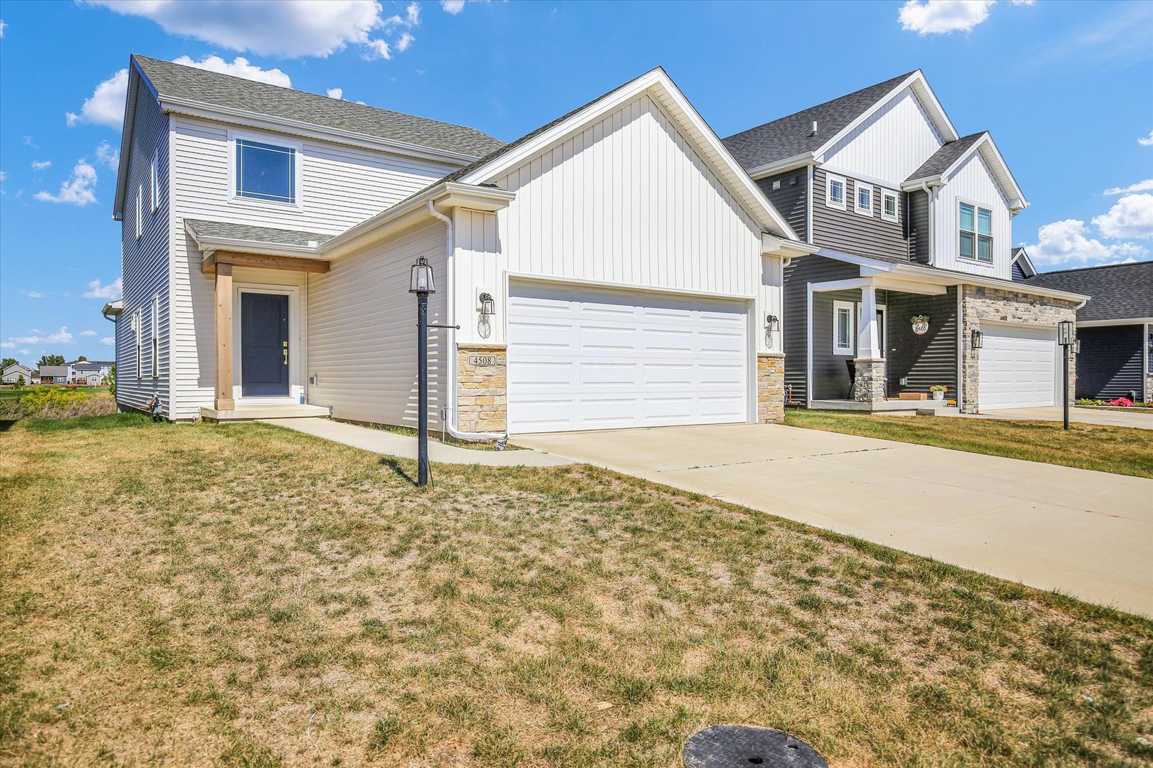4508 Legends Drive Champaign, IL 61822 - Photo 1 of 45 a front view of a house with a yard