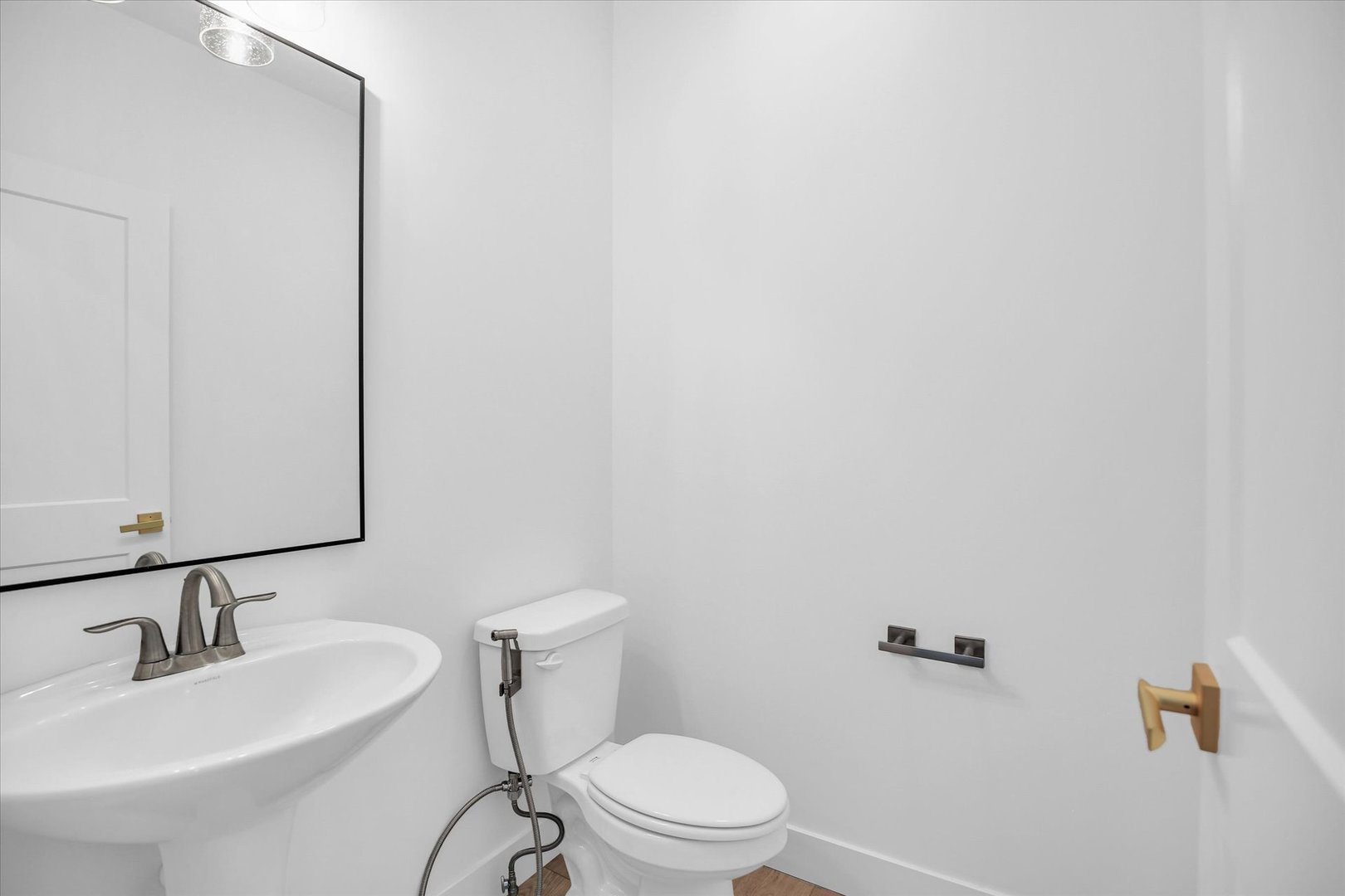 4508 Legends Drive Champaign, IL 61822 - Photo 17 of 45 a bathroom with a toilet a sink and mirror