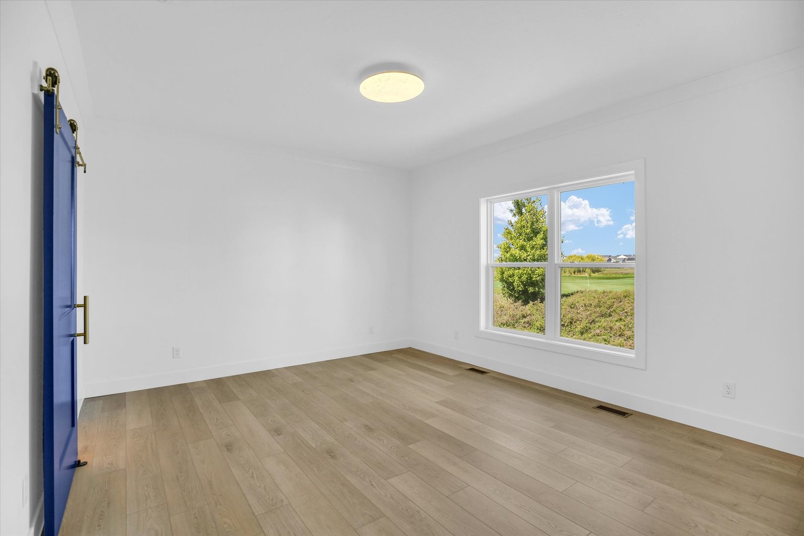 4508 Legends Drive Champaign, IL 61822 - Photo 18 of 45 an empty room with window and mirror